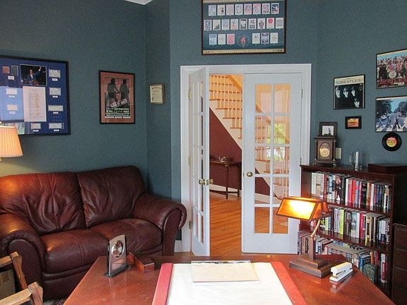 Close the French doors for privacy and still have plenty of light.  Crown molding, hardwood floor.