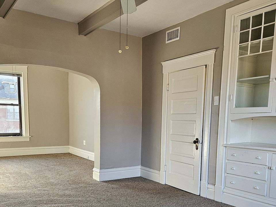 Two large rooms with a lovely arch separating them