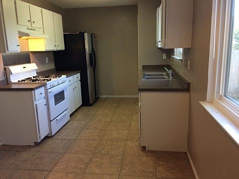 KITCHEN DISHWASHER AND REFRIGERATOR INCLUDED