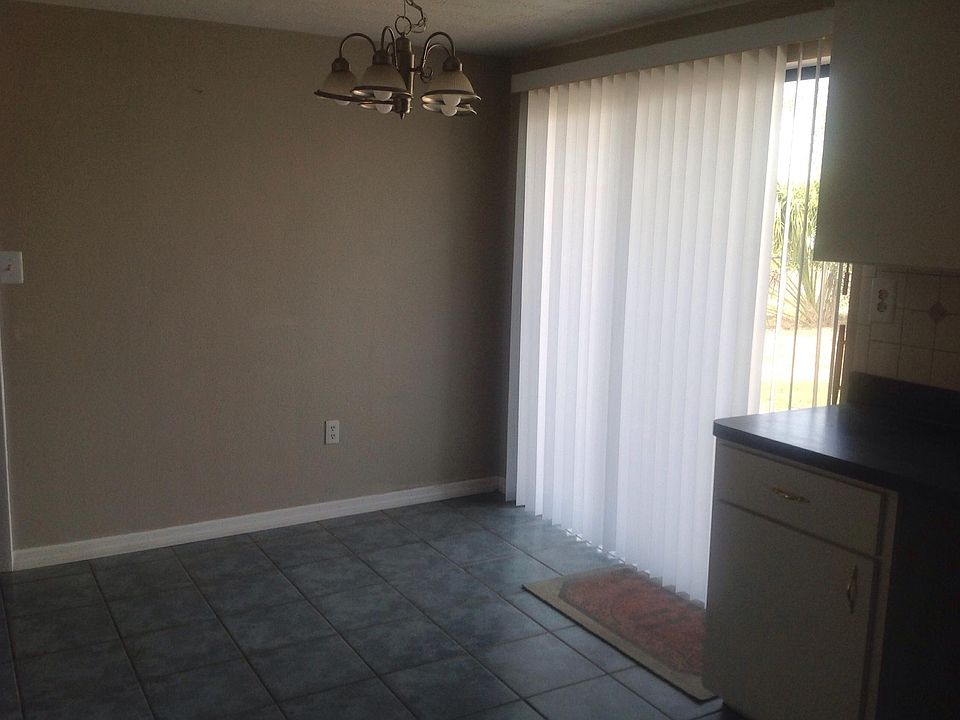 Dinette has Sliding Door to Large Patio