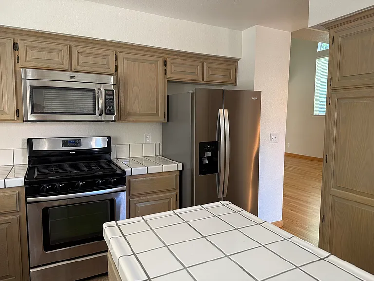 KITCHEN WITH NEW REFRIGERATOR