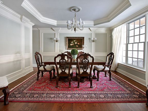 Formal Dining Room with Shimmering Chandelier