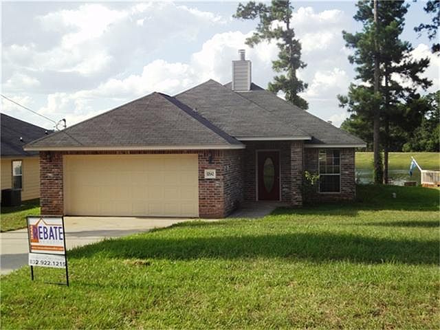 Front Elevation - Lake behind house