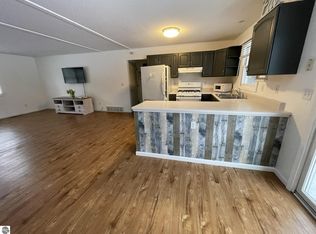 10511 Lake Of The Woods Rd, Mancelona, MI 49659