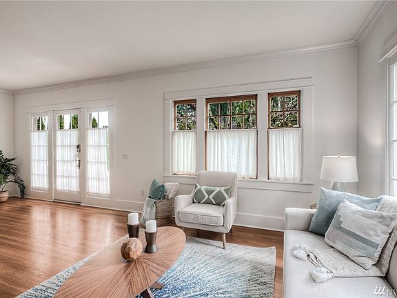 new, wood wrapped, double hung, windows throughout the home