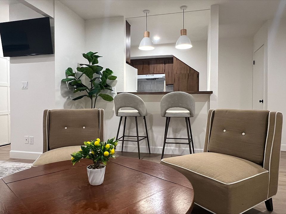 Large countertop space for meals, studying, and socializing, with beautiful bright dimmable pendent lights above.