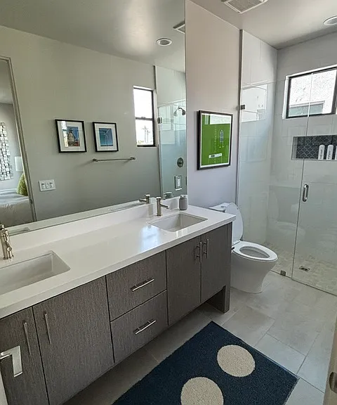 Second upstairs bathroom. Double sink, walk in shower.