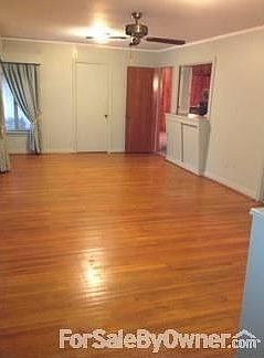 Large Family Room
						:
						Hardwood floors with pass through to kitchen and wide windows overlooking patio.