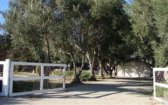 Gated and completely fenced.