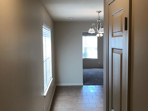 Hallway from bedroom area to dining/kitchen