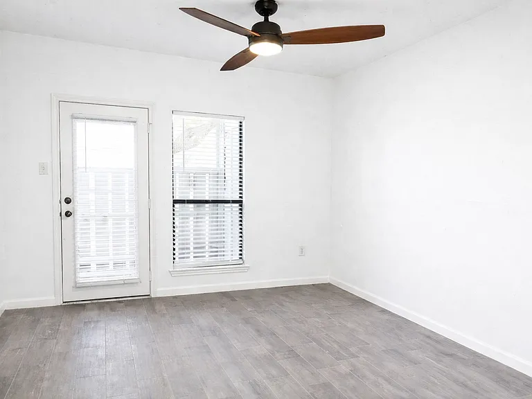 Primary Bedroom with Walk-in Closet and Private Patio