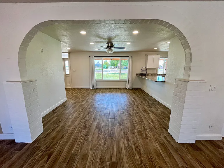 Brick Arch way, open to living/family area.