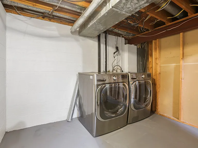 Laundry room. High-end washer and dryer.