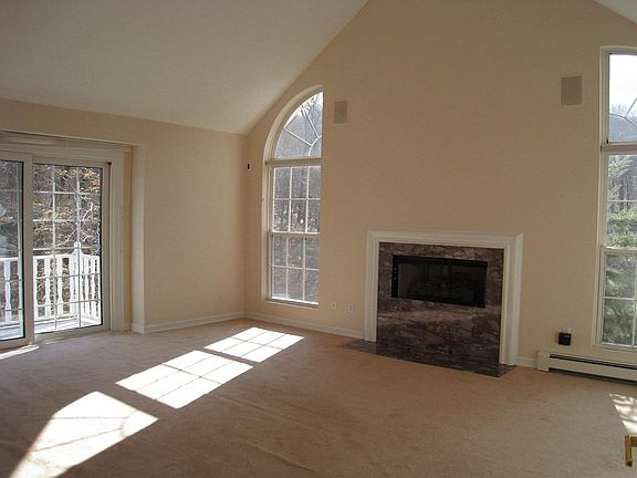 Master Bedroom with huge closet room, gas fireplace and balcony