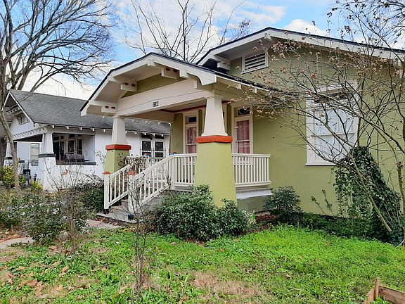Beautiful stucco home, all redone and gleaming. Historic houses all around have been or are in the process of being renovated.