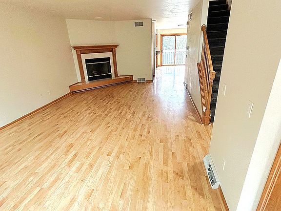 Spacious living room with fireplace