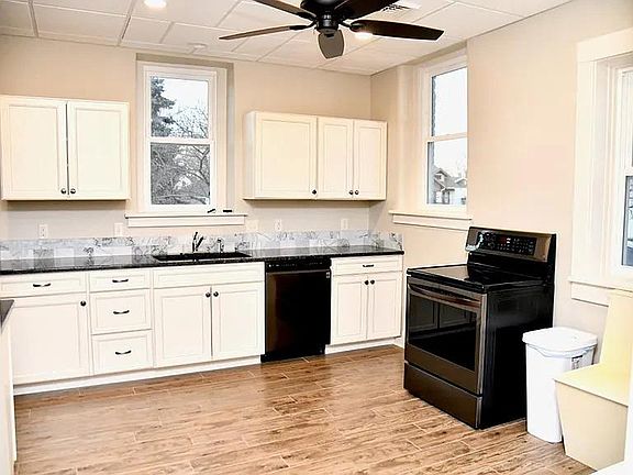 Shared Kitchen with oven, 5 burner stove, dishwasher, fridge, freezer, microwave, toaster oven, air fryer, crockpot, hand blender, electric kettle, and Keurig