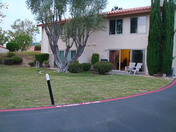 Backyard, showing private driveway