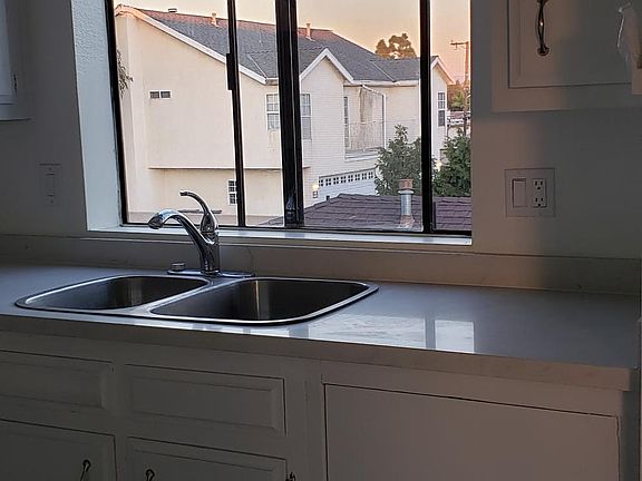 new quazt countertop, new sink,new faucet , new remote control motion sensor dimable light