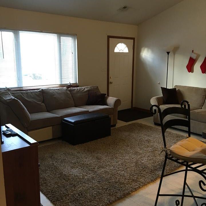 Living Room has vaulted ceiling and ceiling fan
