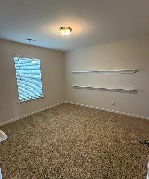 Rear Bedroom - view from kitchen.
