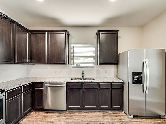 The Ontario comes with a full suite of stainless-steel appliances, including refrigerator