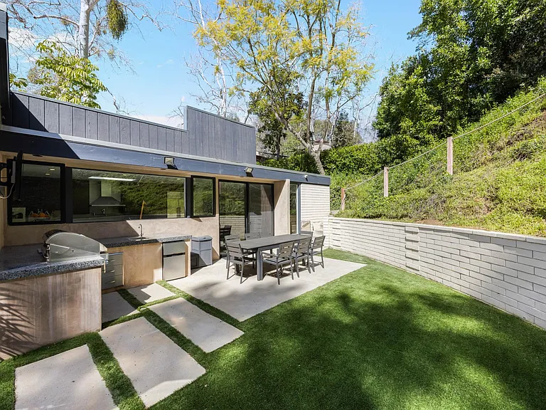 Fire up the BBQ grill in the backyard, sizzling up delicious meals while enjoying the fresh air and serene surroundings.
