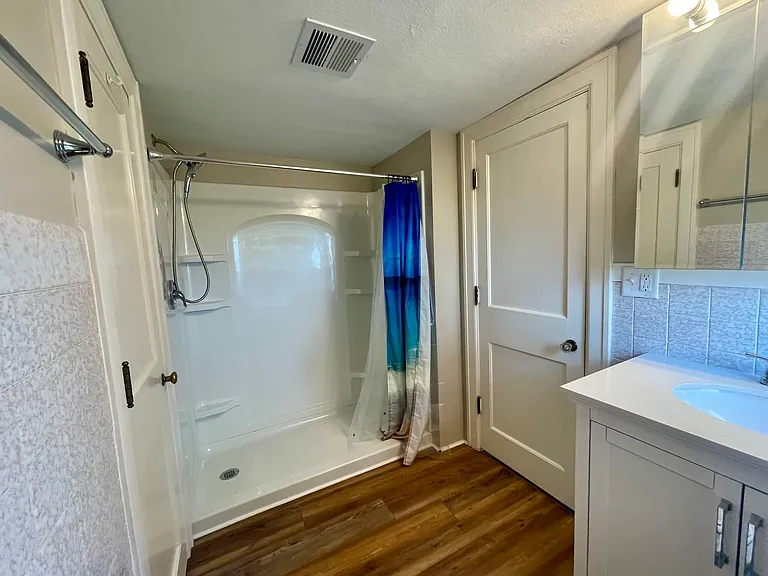 Full Bathroom between bedroom #1 & bedroom #2