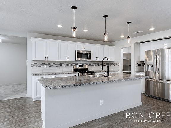 Kitchen with door to mudroom
