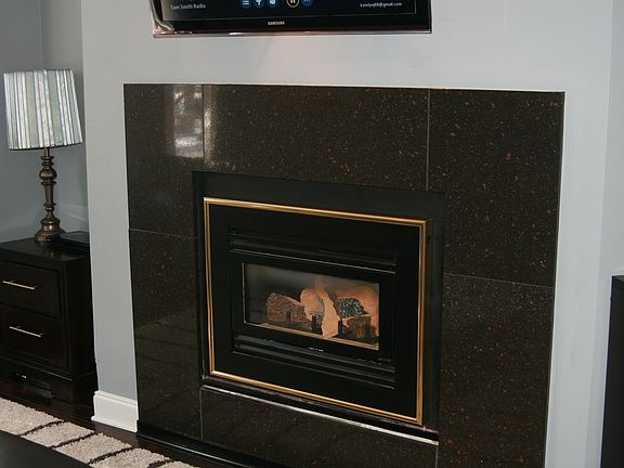 Beautiful gas fireplace with high end stone finishing