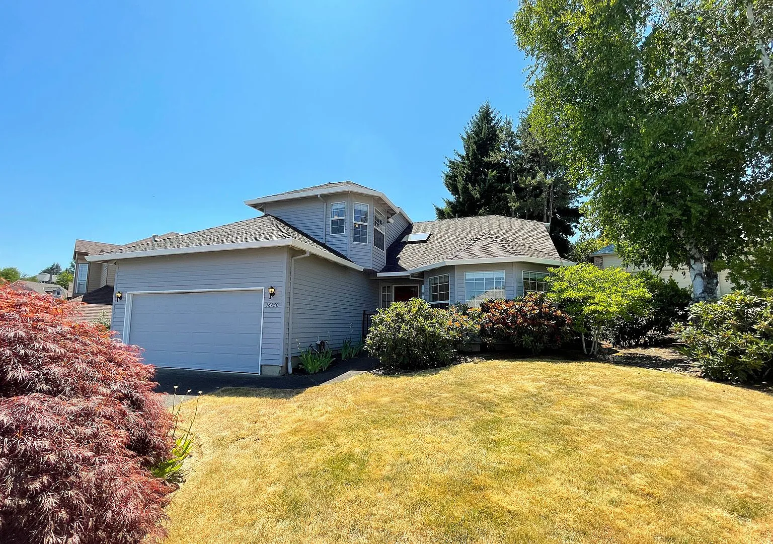 Gorgeous Beaverton home available with attached garage, fenced yard & more! — Photo 1