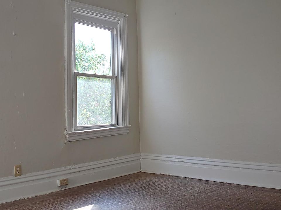 Sunny second floor bedroom