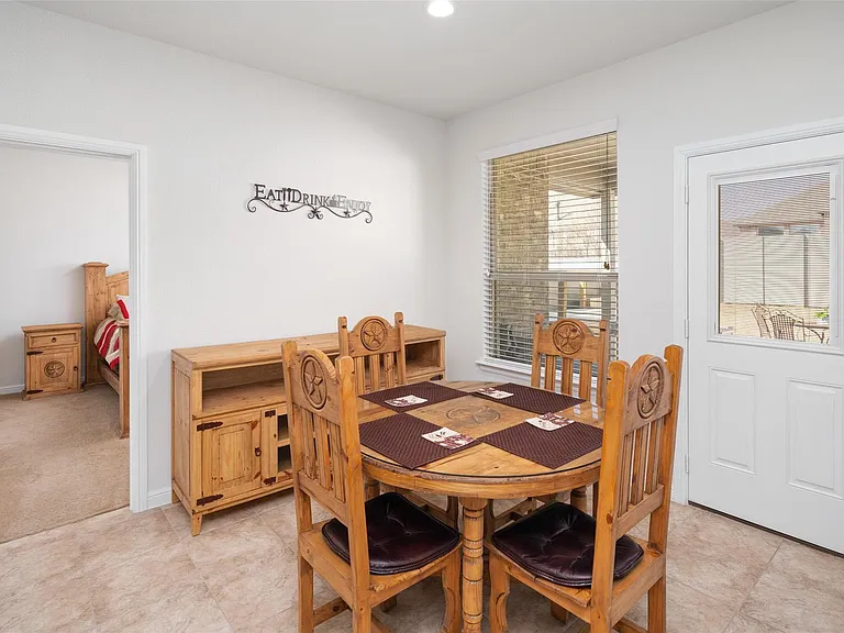 The pictures were taken while the home was occupied. None of the furniture is included with the home.