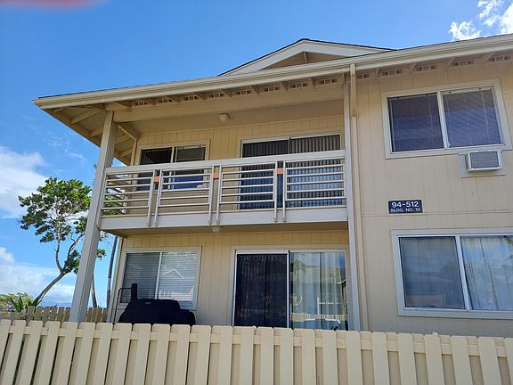 Upstairs corner end property.