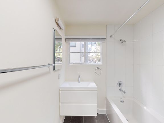 Bathroom with sink and bathtub
