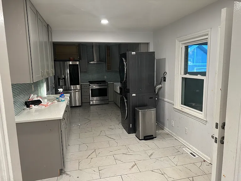 Kitchen includes New Fridge, Microwave and new Washer/Dryer included with the rent
