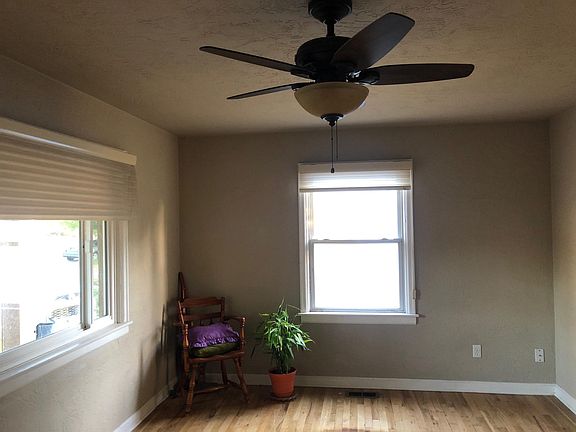 Main living room. Ceiling fan and dimmer light.