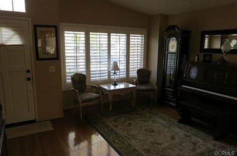 The door leading back outside and formal living area.