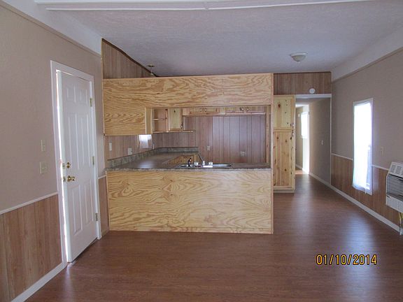 LIVING AREA LOOKING IN KITCH
