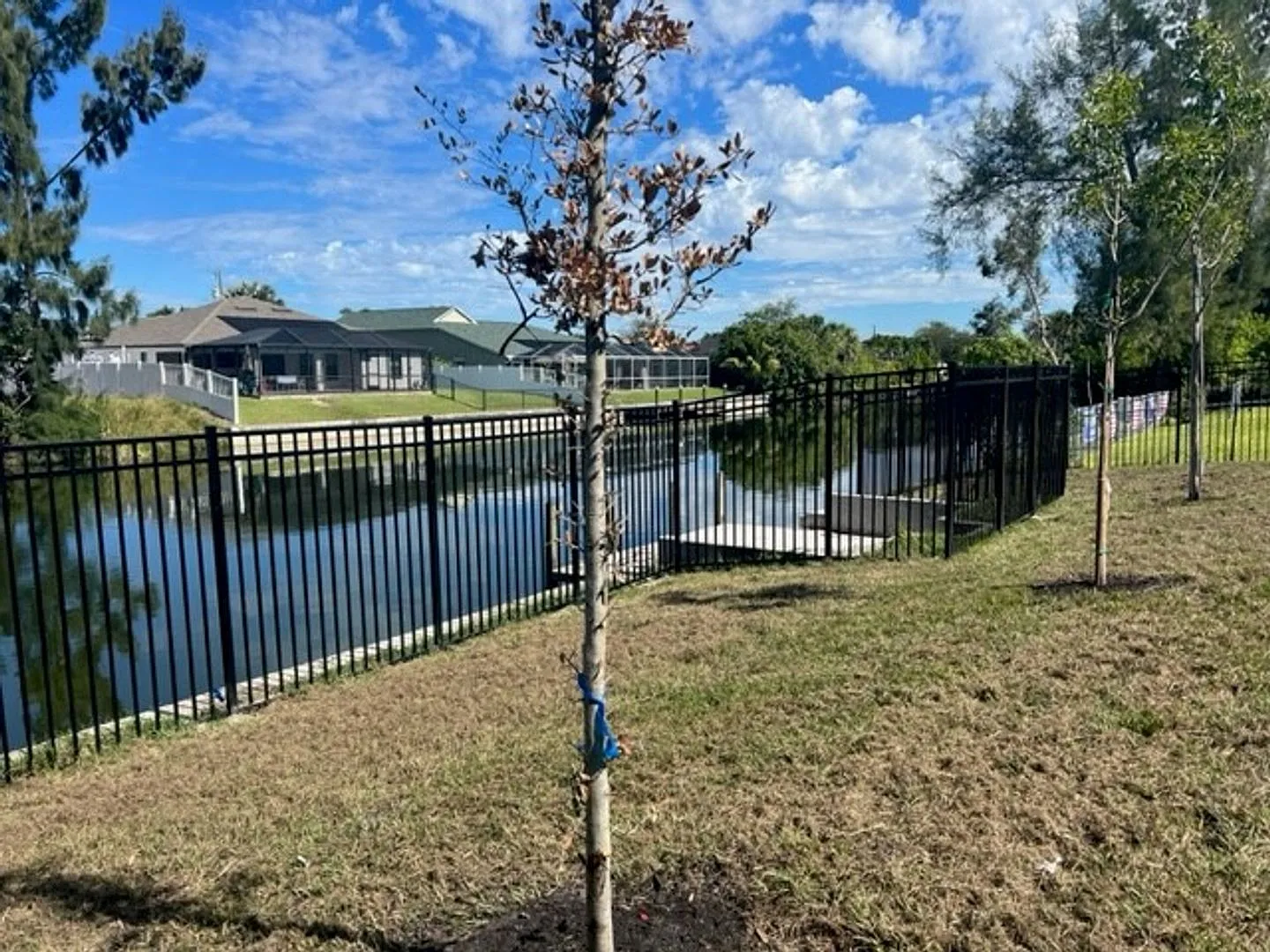 Brand-New Canal Front Home with Private Dock, 3-Car Garage & Modern Upgrades in Cape Coral — Photo 3