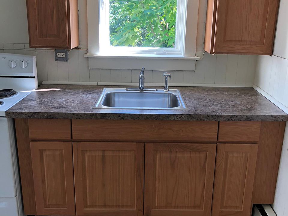 Kitchen with brand new cabinet, sink and counter space