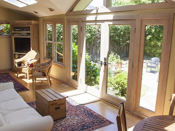 Great room in back looks out on private yard- 6 glass skylig