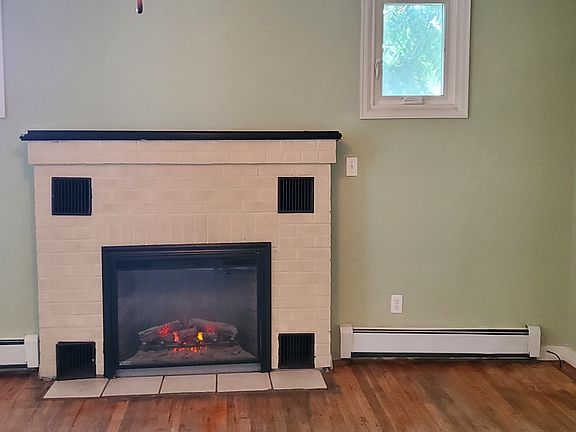 Living room with electric fireplace, sweet!