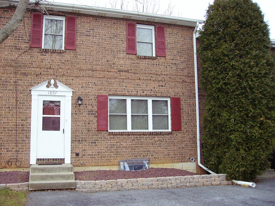 Front of house with parking for 2 cars