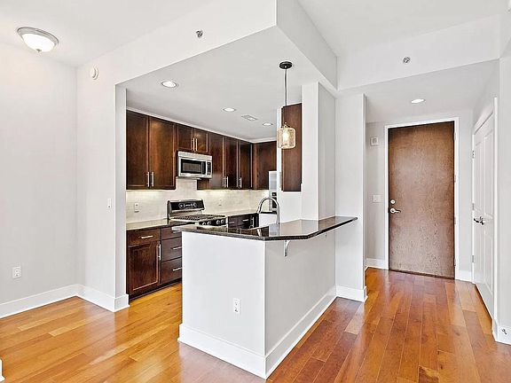 Just inside - looking back at front door and kitchen