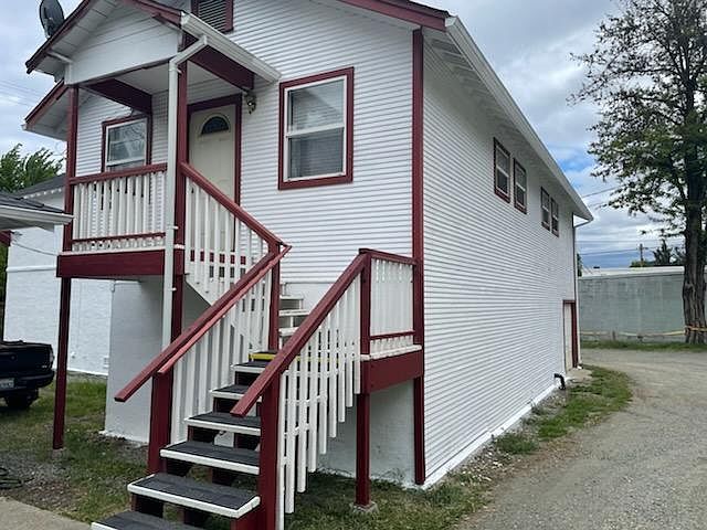 front view (w/front porch) of the unit and duplex building. The 2 studios apartments are back to back and not side by side.