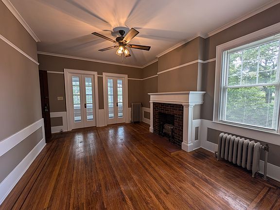 View of living room to 3 season porch