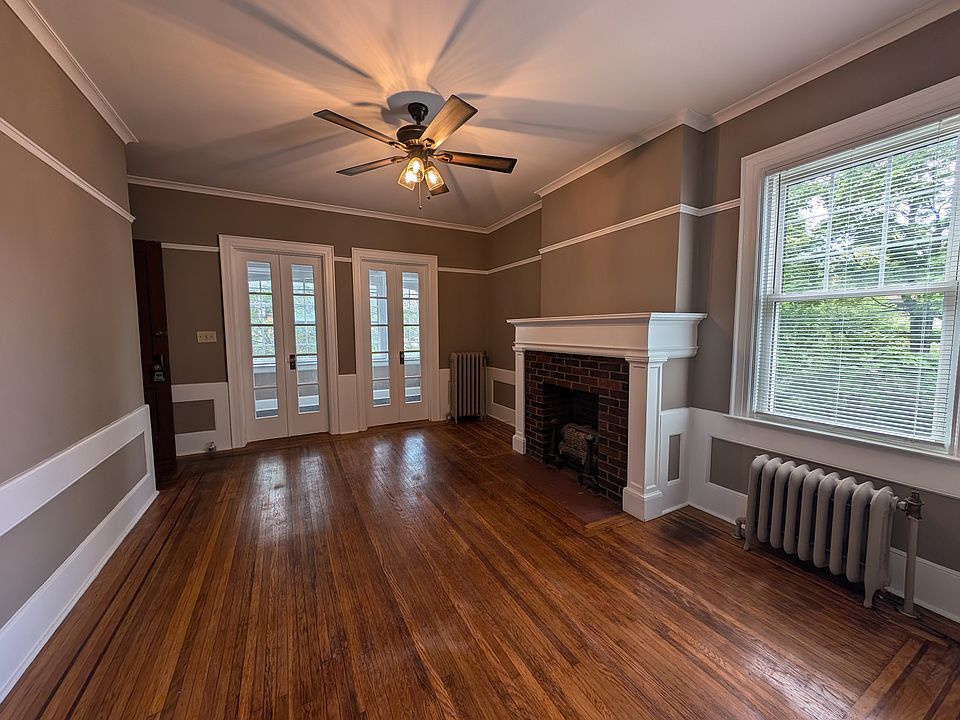 View of living room to 3 season porch