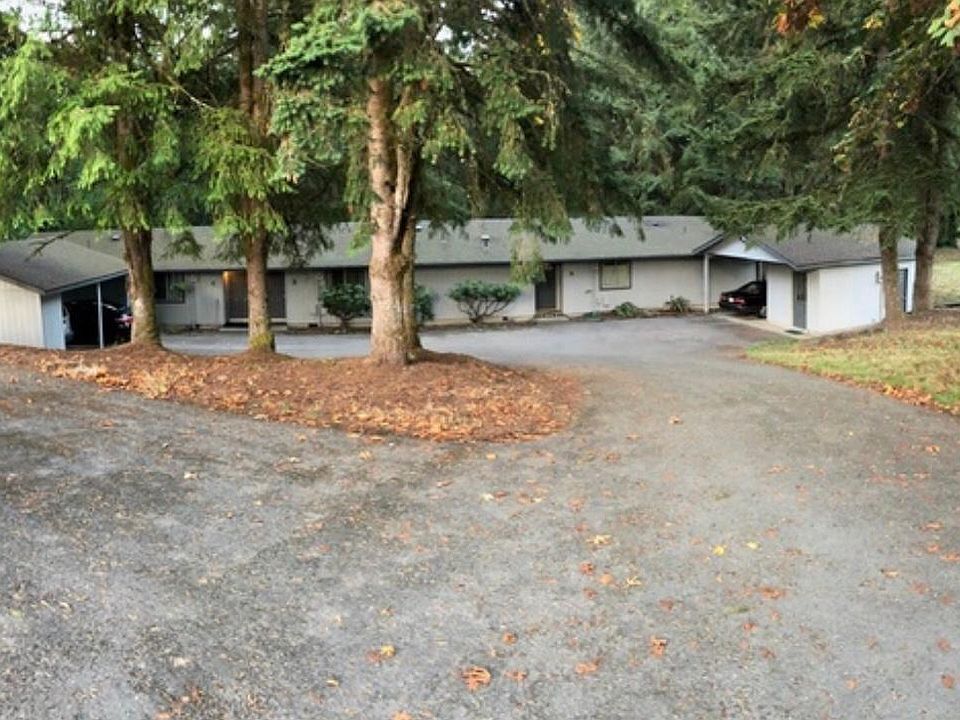 Front of property showing covered parking