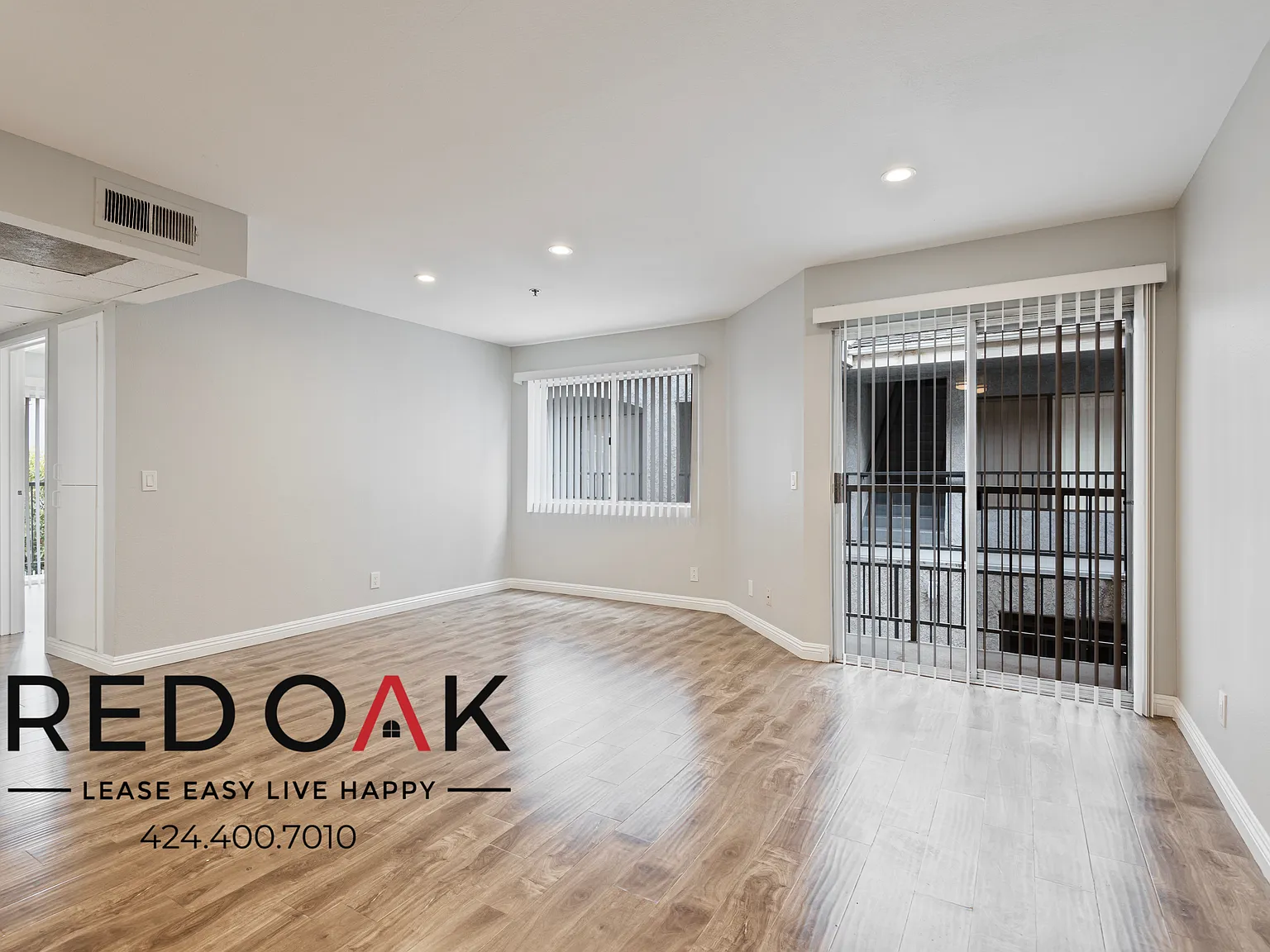 Bright and Spacious Two-Bedroom with Private Balcony, On-Site Laundry, and Two Parking Spaces Inc... — Photo 2